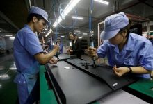 La actividad de las fábricas Chinas se expande más lentamente en diciembre, pero la confianza repunta